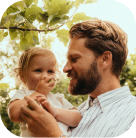 A parent sharing a small moment with a child